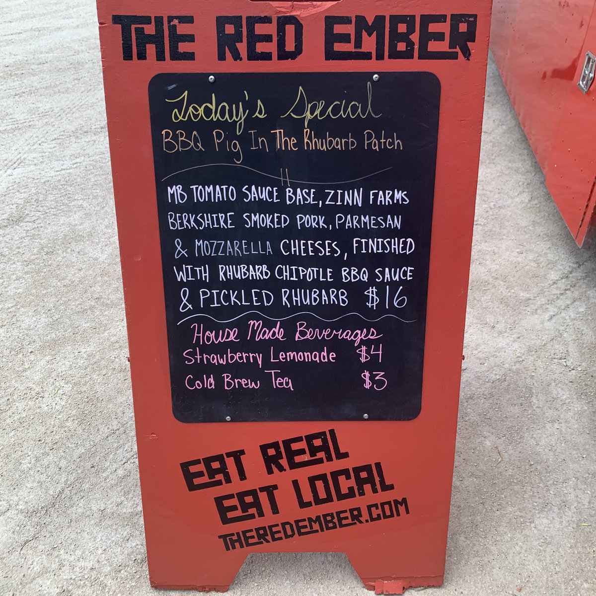 What is big, red and makes pizza? The Red Ember at the fist Wednesday market <a href="/stnorbertmarket/">St. Norbert Farmers’ Market</a> ! Today’s special is BBQ Pig in the Rhubarb Patch.
