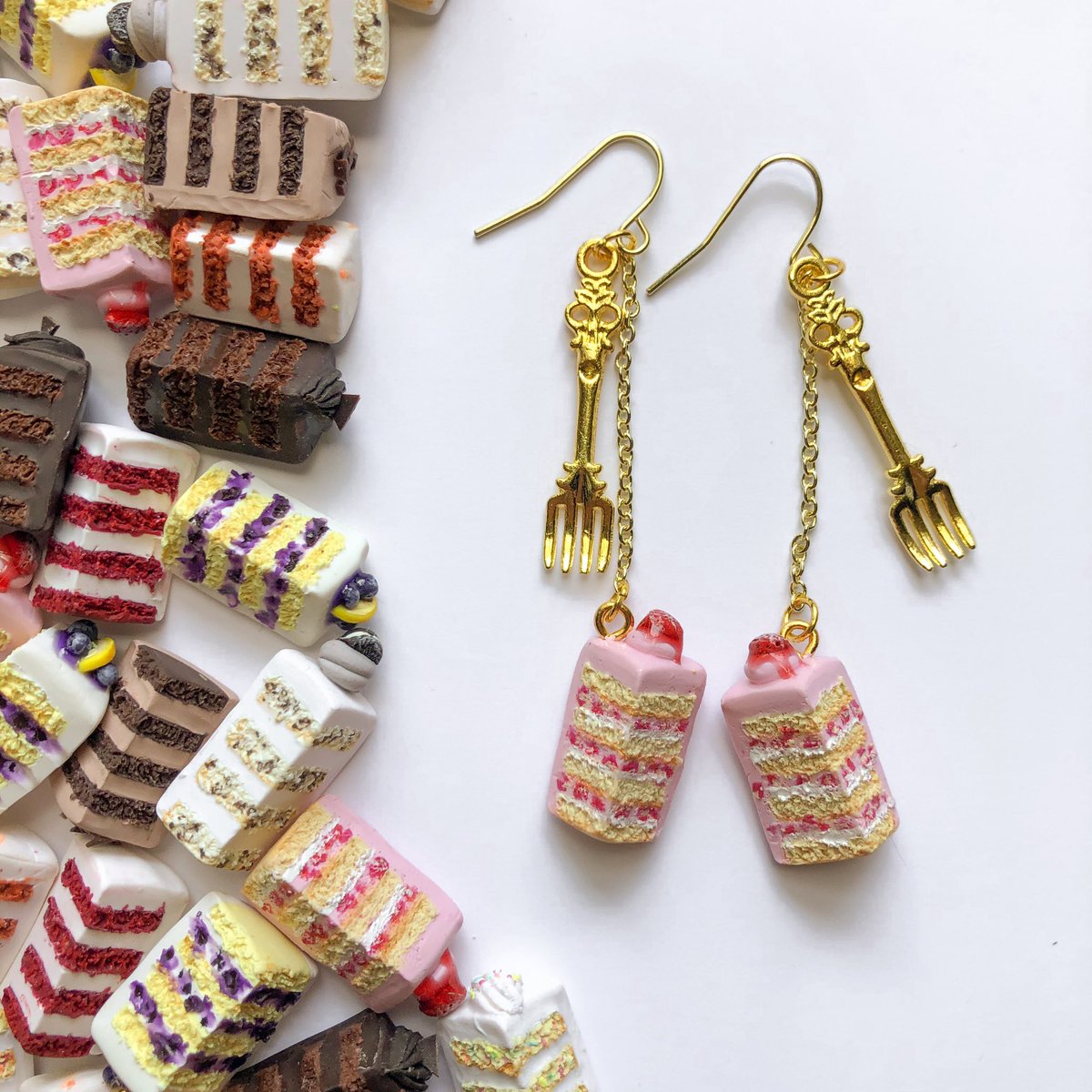 etherealartiste's tweet image. i made my first ever earrings! care for a slice of cake? 🍰✨