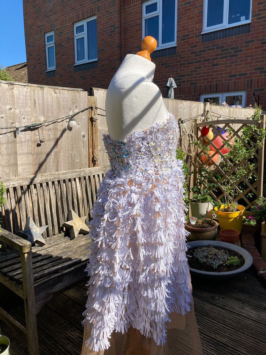 UckfieldCollege's tweet photo. Well done Yr 13 student Lily May who has been chosen to exhibit her fantastic Prom Dress at the EcoFashion Competition final show at Battle Abbey! The title of the piece is ‘Shredded dreams’ and the materials used are mesh fabric, recycled shredded paper and cotton thread https://t.co/l7vBngJG2Y