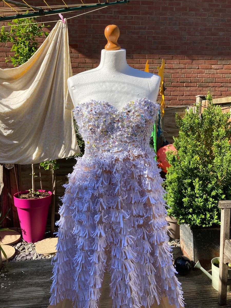 UckfieldCollege's tweet photo. Well done Yr 13 student Lily May who has been chosen to exhibit her fantastic Prom Dress at the EcoFashion Competition final show at Battle Abbey! The title of the piece is ‘Shredded dreams’ and the materials used are mesh fabric, recycled shredded paper and cotton thread https://t.co/l7vBngJG2Y