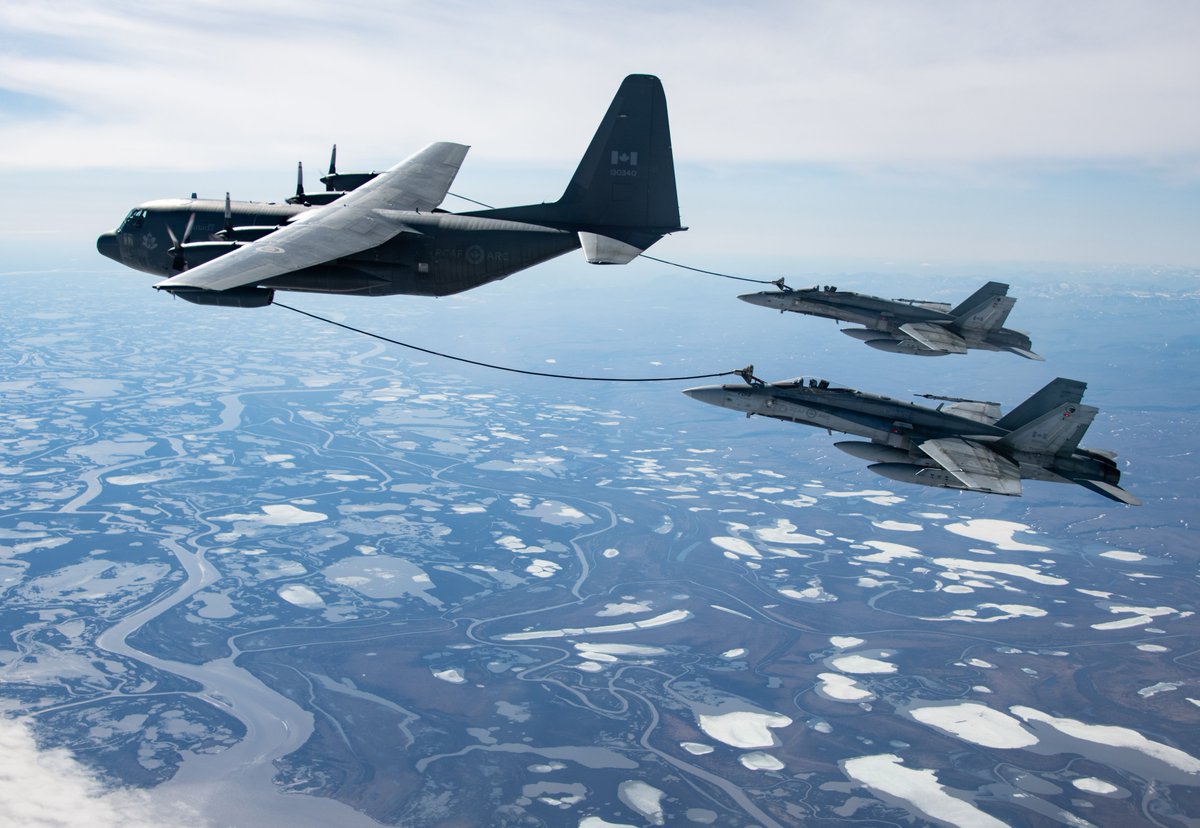 RCAFOperations's tweet photo. .🇨🇦 CF-18s operating out of Inuvik, Northwest Territories, join up behind a #RCAF CC-130T tanker aircraft to refuel during North American Aerospace Defense Command’s air defense exercise #AmalgamDart, June14, 2021. @RCAF_ARC @NORADCommand https://t.co/bwlsOyKIZq