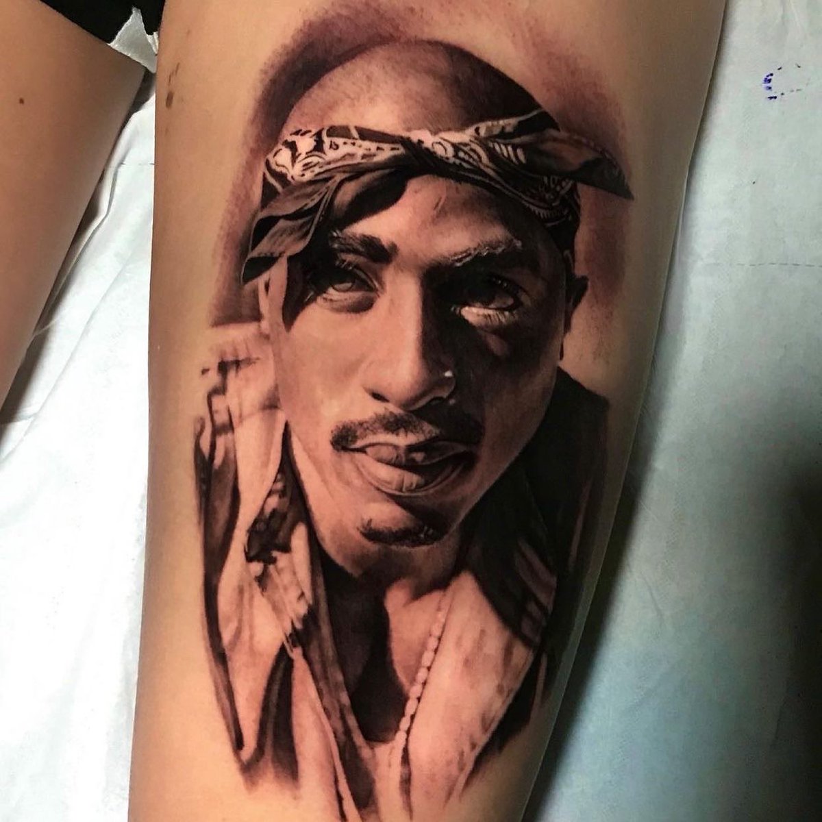 RockTheBells's tweet photo. To this day, fans’ devotion in memory of #2pac is second to none. Some have even made their dedication to the late superstar permanent. Whose ink are you feelin’ the most? #2PAC50 #HBDPAC 🌹 https://t.co/Yv7wzBb2mU