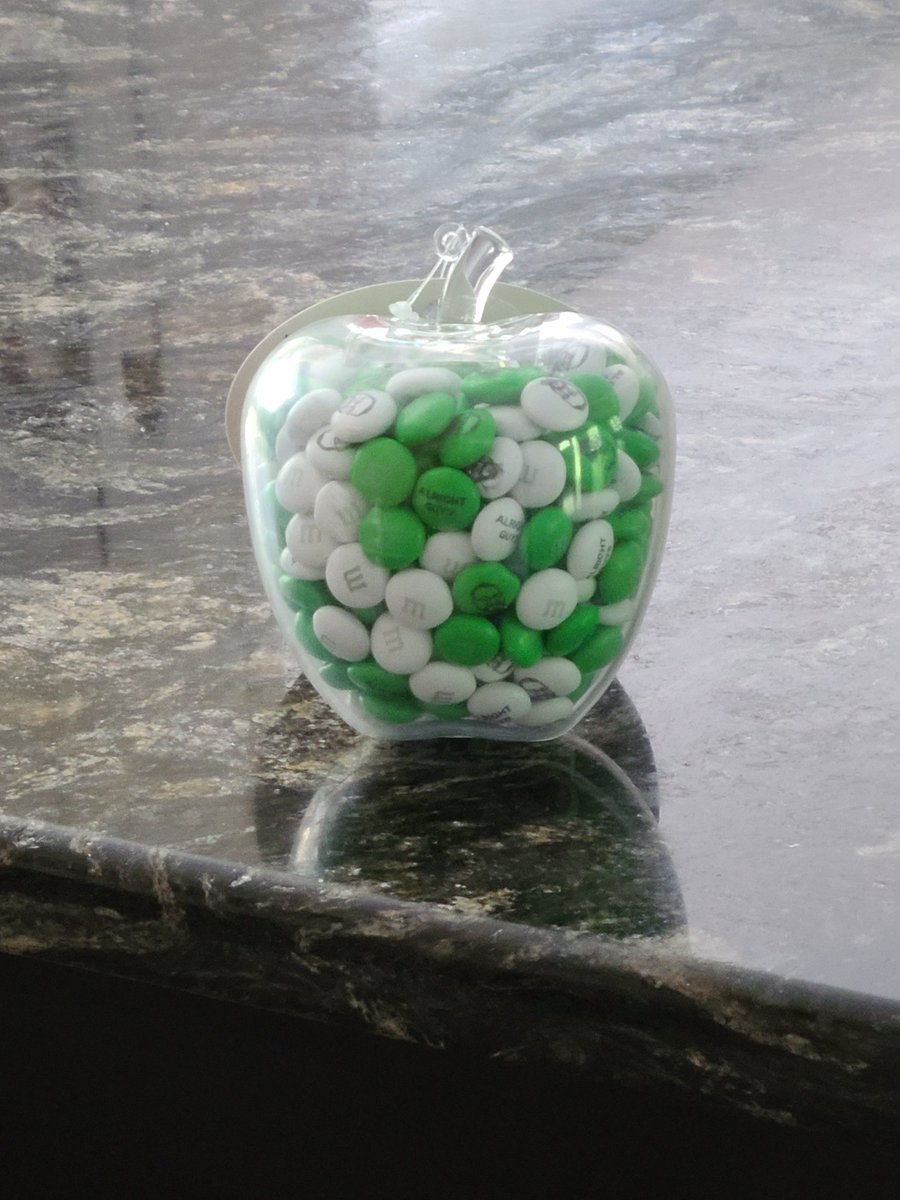 decrepit_dego's tweet photo. Check out this gift! So grateful. More proof that I've got the best students. It was cool enough that it was @mmschocolate in a plastic apple... but then they literally put my face on them! #alrightguys #grateful #Classof2021 #gnbvt #mediatech https://t.co/9fPEXTogtx