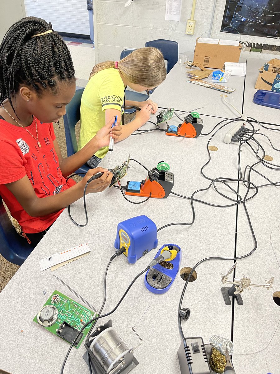 GoodgameSteve's tweet photo. What do you do for summer fun? These two young ladies are learning to  solder and build their own FM radio receivers! #summercamp #stem @elenco #godores https://t.co/C2Q9z2iqpF