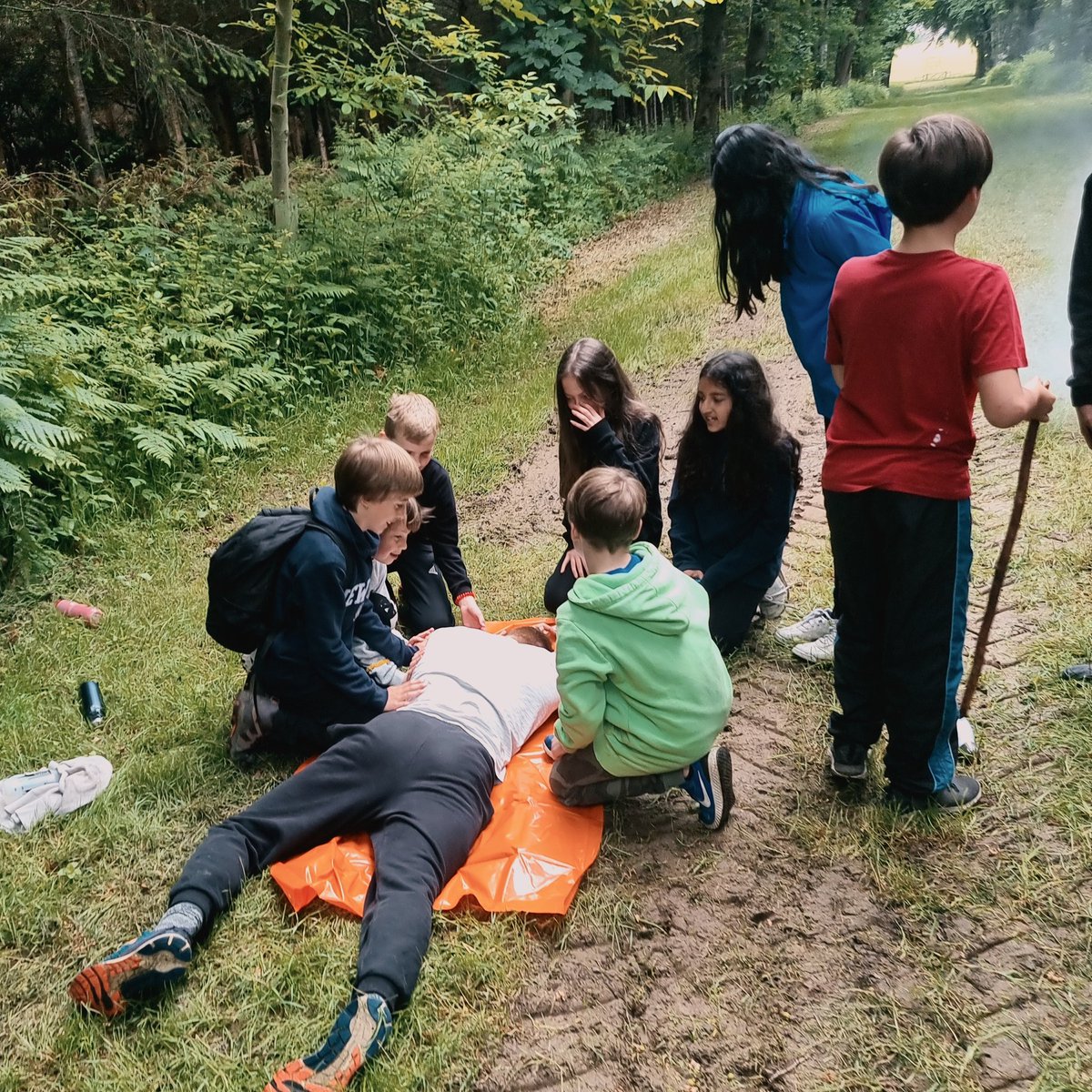 'Sir, we found the other teachers like this. We need to help!' Year 6 putting their bushcraft first aid 'skills' into action.