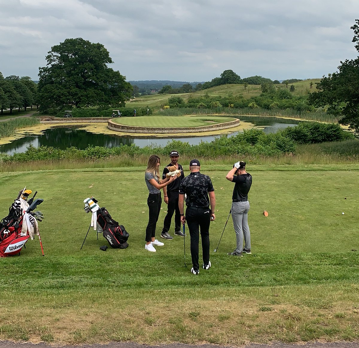 A little challenge for three of the @PGAEuroProTour lads to win a teddy bear here on the par-3 course at <a href="/CumberwellPark/">Cumberwell Park</a>! Nearest the pin with a twist. Could you hit the green one-handed, blindfolded or with a putter?