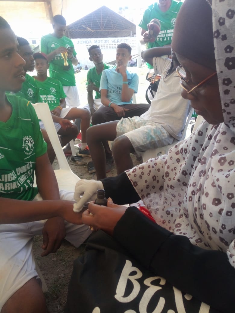 Our founder doing what she like most,first aid at Lasco youth tournament. 
#Alnurcbomombasa
#Brighteningthefuture.