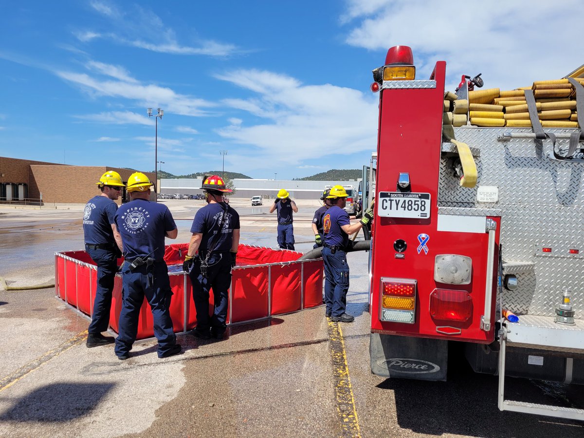 RapidCityFire's tweet photo. Crews are out practicing for their upcoming Pro Board FADO (Fire Apparatus Driver/ Operator) test. Thanks to the Rushmore Mall for allowing us to use your parking lot! @RushmoreMall https://t.co/lWd2o0efNC