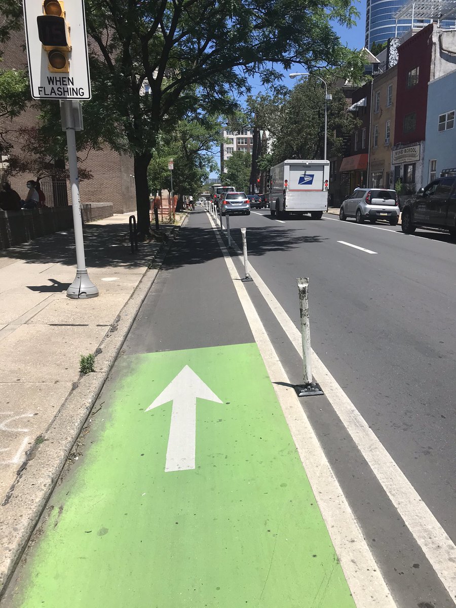 22nd Street bike lane (which is not new, but isn’t old either) is a good example of why parking-protected and posts work. Left: no posts, right: posts