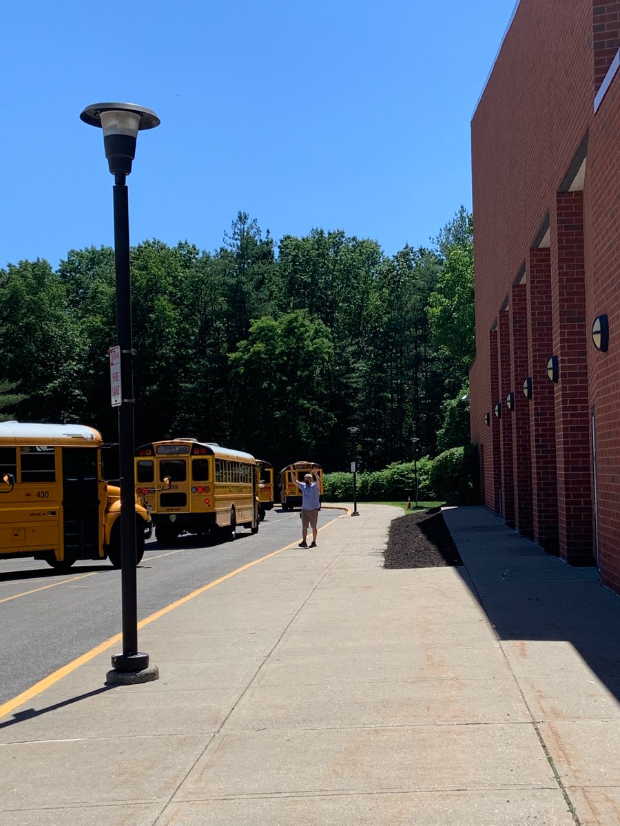 we_are_maple's tweet photo. Mr. Singer and Mr. Harris load up the busses while staff waved best wishes to Cohort 2 today! https://t.co/bD6LMvzRWo