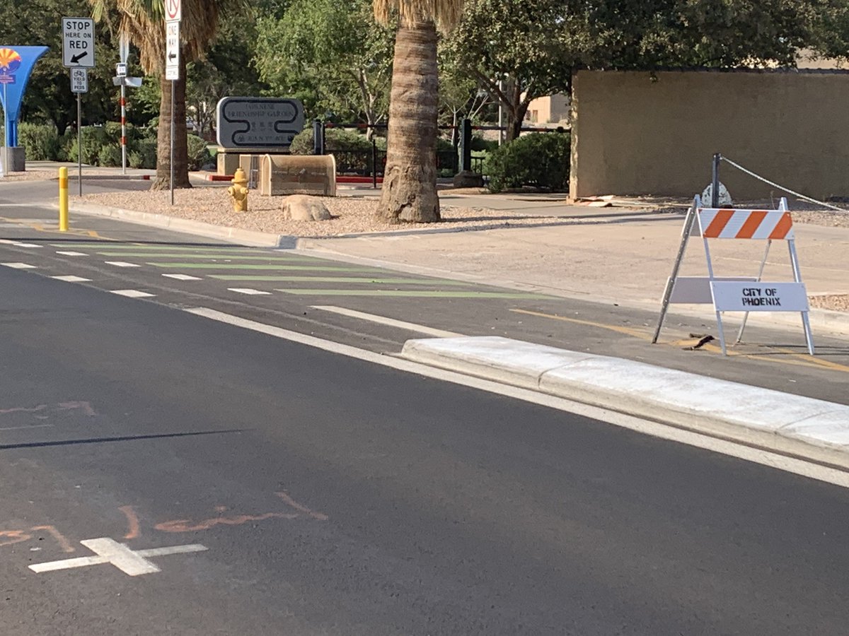 BWebbFox10's tweet photo. Drivers are getting a crash course on the city’s 10 day old 2-way Protected bike lanes along 3rd Ave. between McDowell in Roosevelt. Neighbors note several crashes by confused / possibly impaired drivers. Cameras will be installed to study traffic behavior. #Fox10Phoenix https://t.co/tPp8gc6Av4