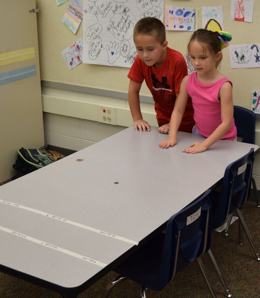 reading4fun1's tweet photo. To practice our math skills on 'P' Day we learned a new game, Push the Penny! https://t.co/4Pmzm4cb0W