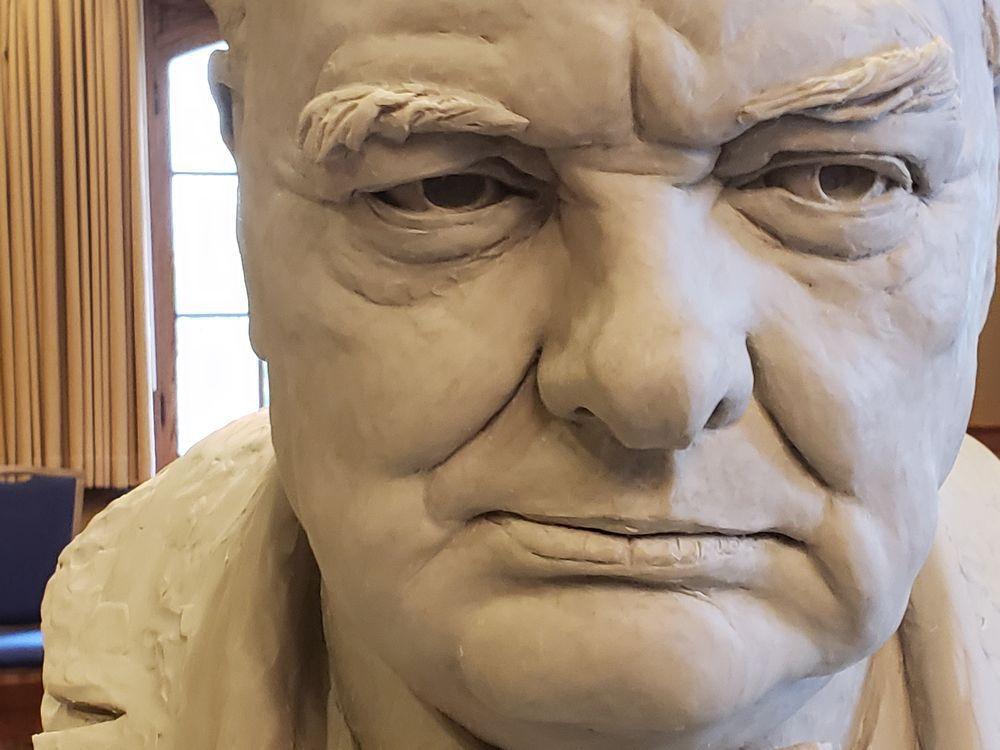 Downtown Edmonton statue of Winston Churchill vandalized with dump of red paint yeg