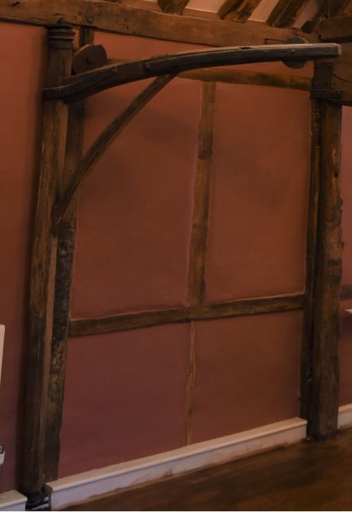 Does anyone know precise use of this?  On first floor of an old barn, by a now blocked-up door to outside.  It has a pulley and swivel arrangement.