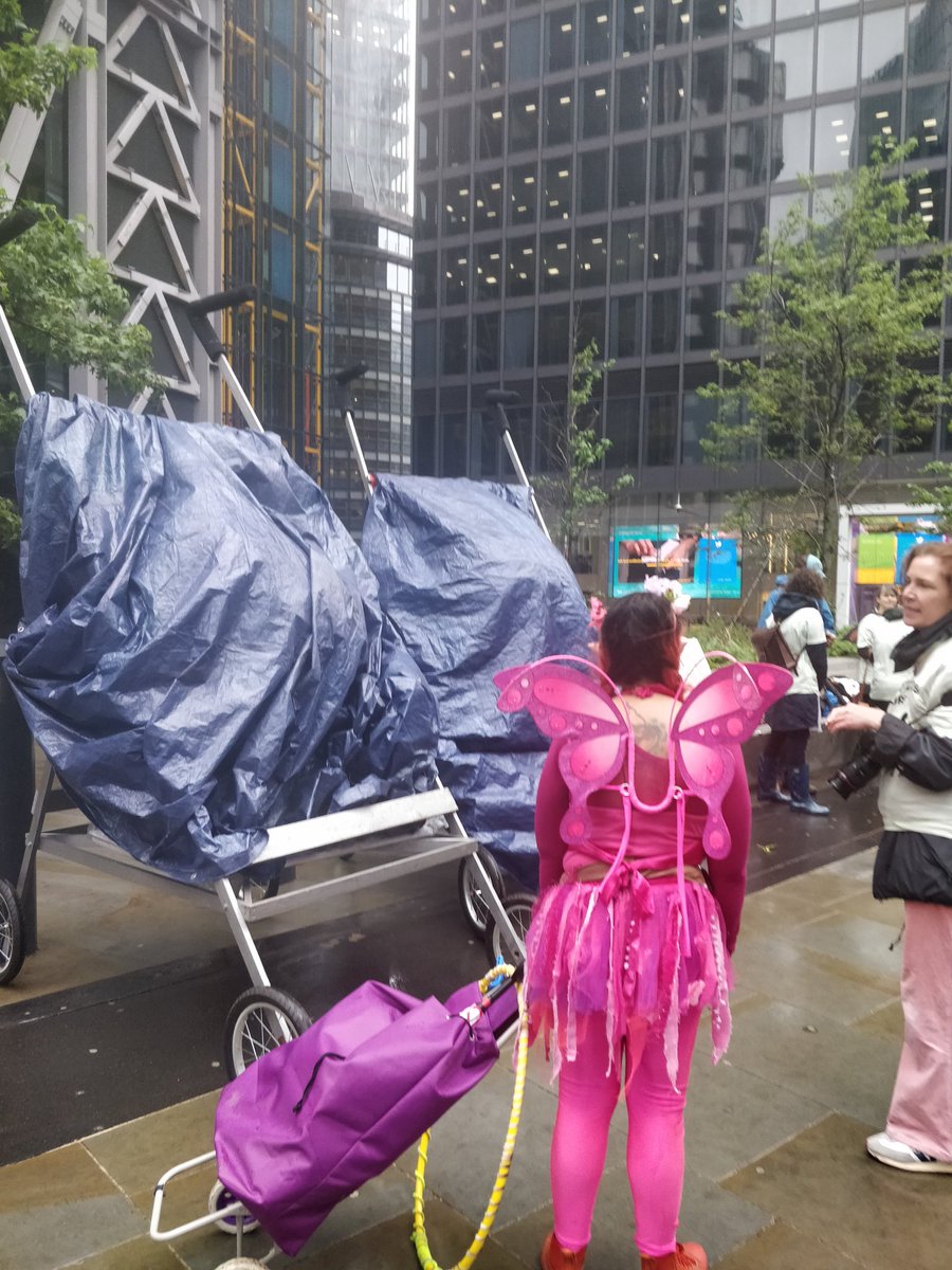 mothersriseup's tweet photo. Unloaded the props and getting ready to deliver our message to @BNCB and @LloydsofLondon - #InsureOurFuture not fossil fuels! https://t.co/TKG27XzWZo