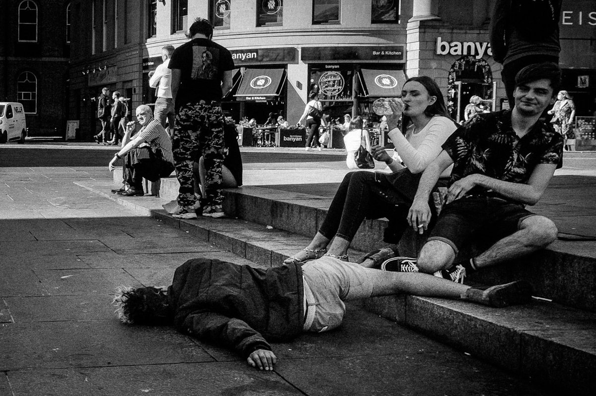 I think this guy may have had a drink! (his friends don't seem too concerned) 🤣 #fujifilm #candid #streetphotography #newcastlelife #thecamerabastard #ncl_spc #ne1streetcollective #blackandwhite #partyanimal #punkindrublic