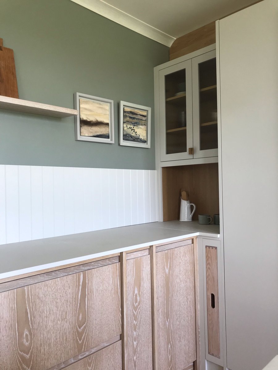 The brushed limed grain oak looks absolutely stunning in the Glaven kitchen. The combination of this elegant finish with our 'Seal Pup White' of the cabinetry gives light to the room and a feeling of a calm and relaxed environment. nakedkitchens.com/exposed-timber… #NakedKitchens