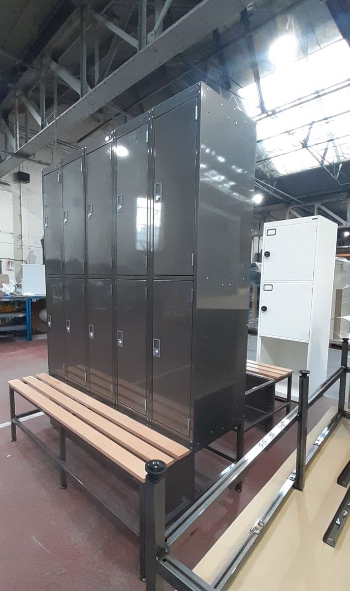 From the factory: Bespoke 2 door changing room lockers with integral bench seat finished in Ferro clear coat lacquer for an industrial aesthetic. 

These lockers are based on our standard ventilated metal locker design, find out more online: flexiform.co.uk/metal-lockers