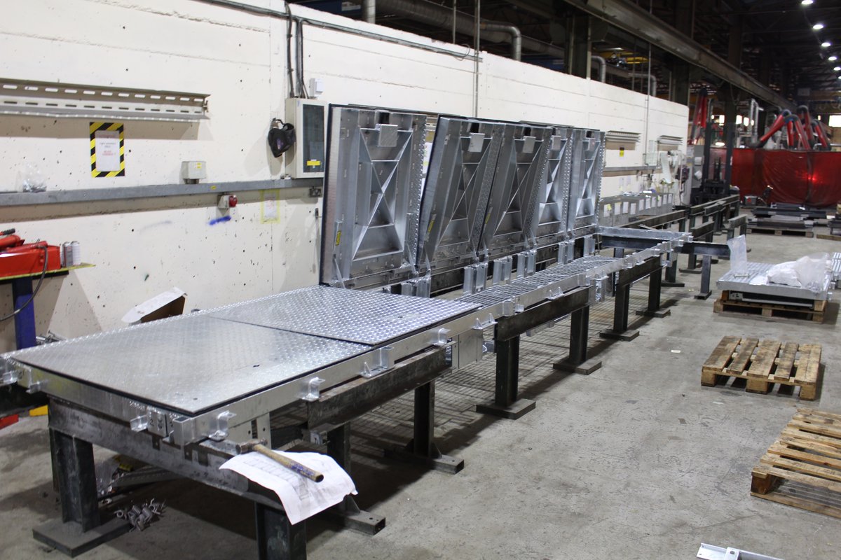 Custom-built security solutions to prevent unauthorised access. LPCB 1175 (SR4) Wet Well 7600mm long x 1100mm span clear opening. Padlocking solid top hidden hinged multiple with odour sealing, removable  beams, G7 hinged mesh fall protection grids under each access cover lid.