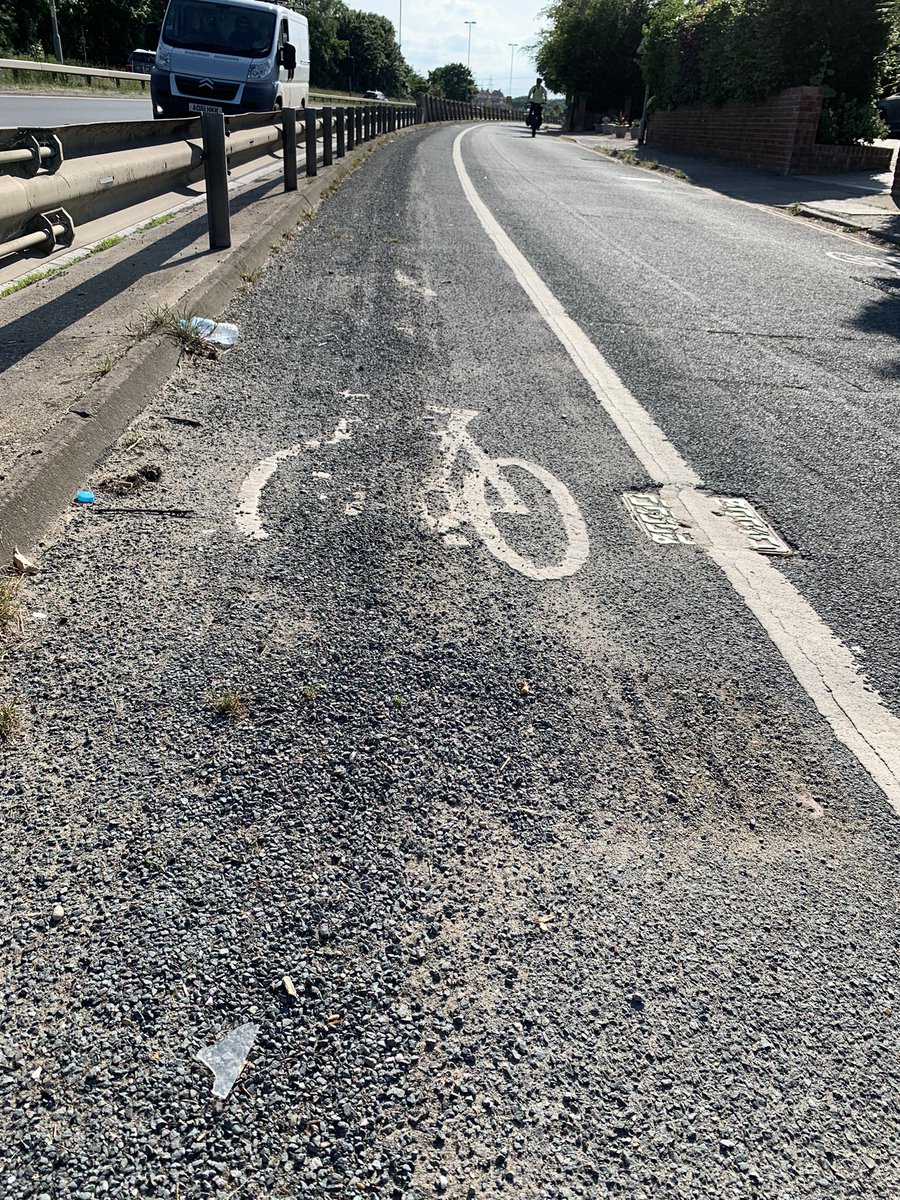 spanners_amy's tweet photo. @NorwichCC if you are trying to encourage people to cycle more, you need to improve the upkeep of existing cycle paths to prevent multiple punctures and accidents. Photo taken on Newmarket Road on 16th June 2021 https://t.co/Ih8f3pgoF1