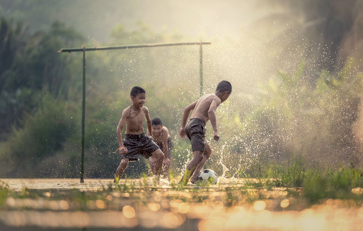 Children playing soccer in a paddy field #malaysia #malaysiatravel #malaysiatrulyasia #lha #luxuryholidaysasia