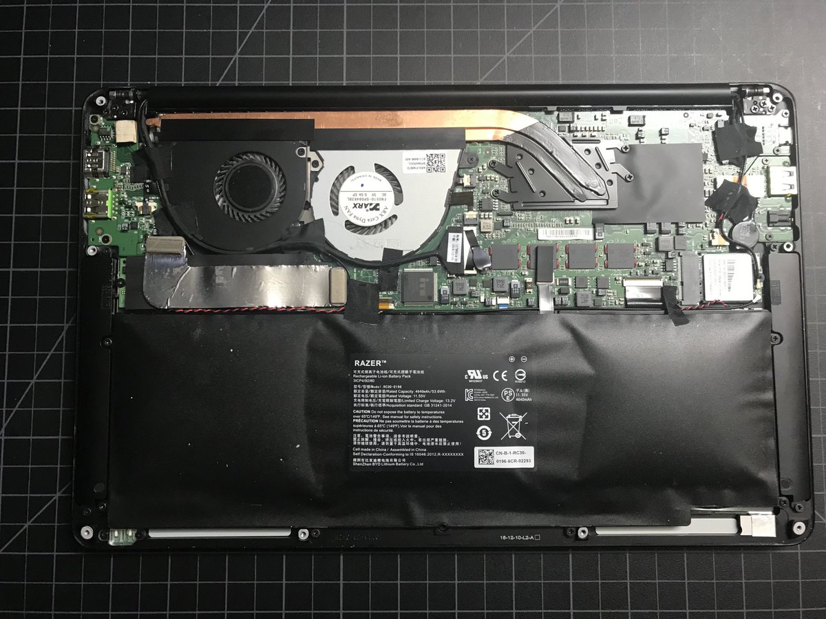 Continued documentation of the exploding but pre-fire phase of ⁦<a href="/Razer/">R Λ Z Ξ R</a>⁩ laptop #3. Batteries swell and crack the HD and motherboard before fire phase.