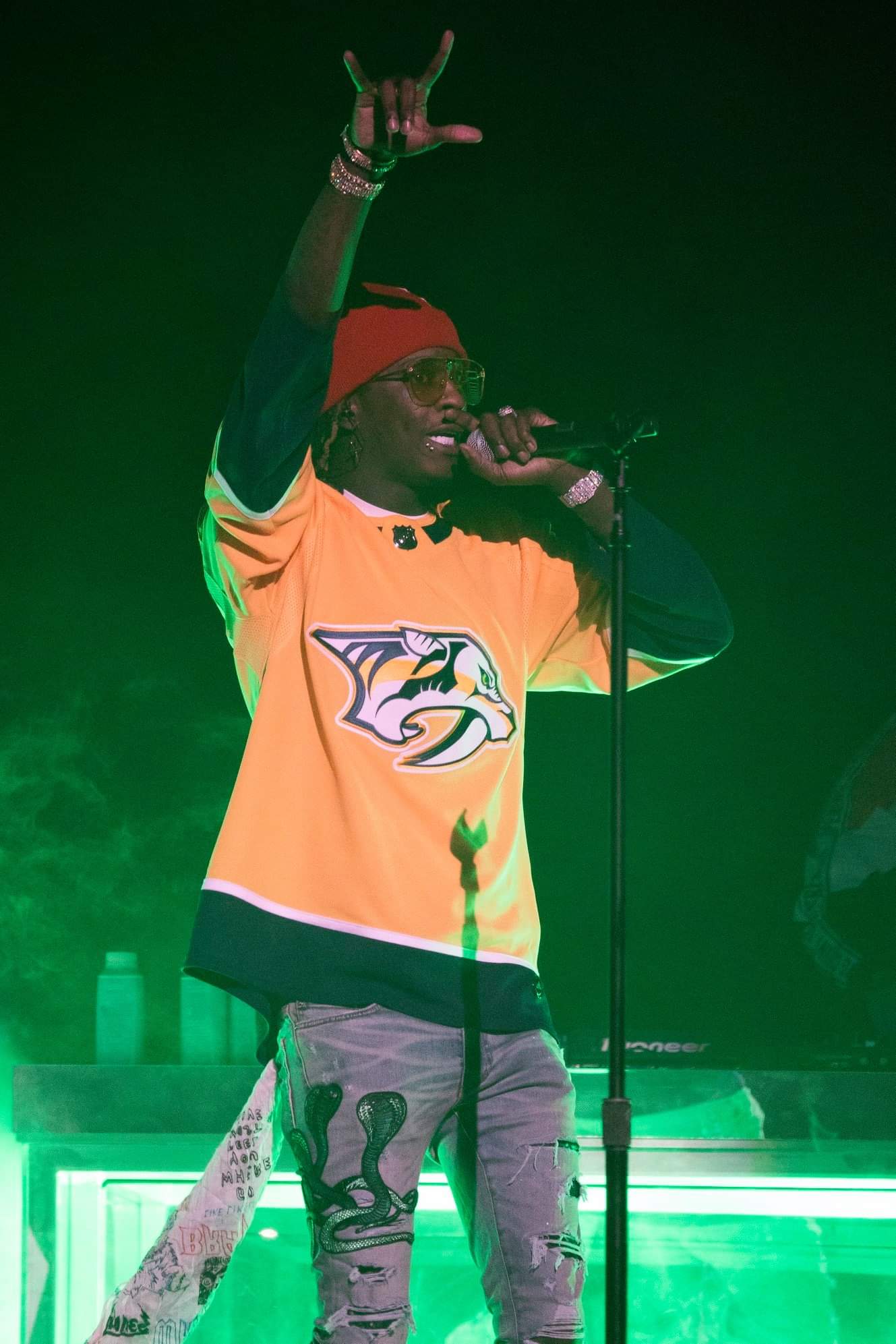 Rappers wearing hockey jerseys