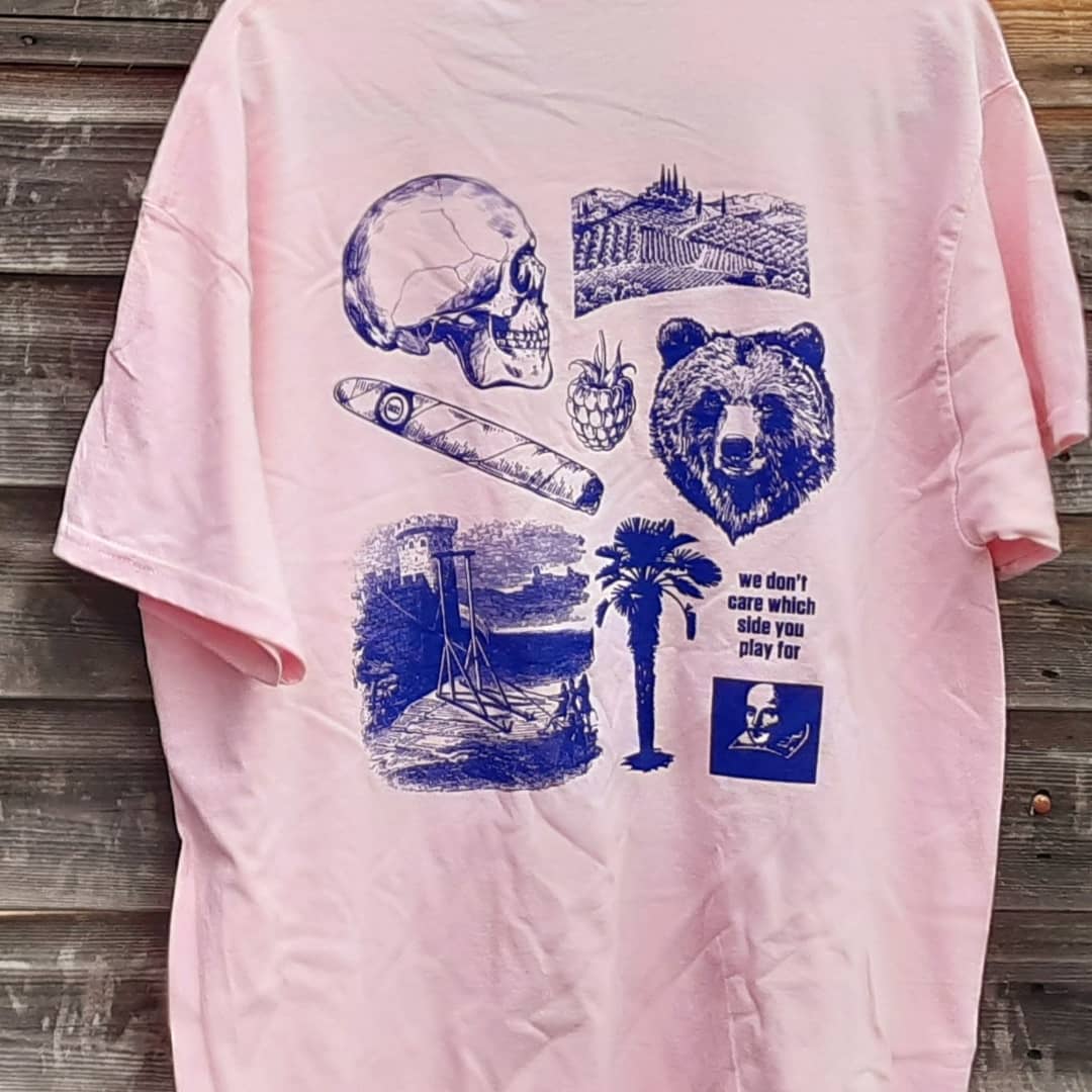 dhstorg's tweet photo. Summer starter kit: t-shirt and illustrated guide to the songs and lore of the Rabble. Featuring walls being pulled down, skull of Yorick, plot of land in Tuscany, and more! Pick up the new summer Dulwich Hamlet t-shirt online at the DHST shop. #DHFC

➡️ https://t.co/cKJhkxtCG8 https://t.co/34nJj5AzqD