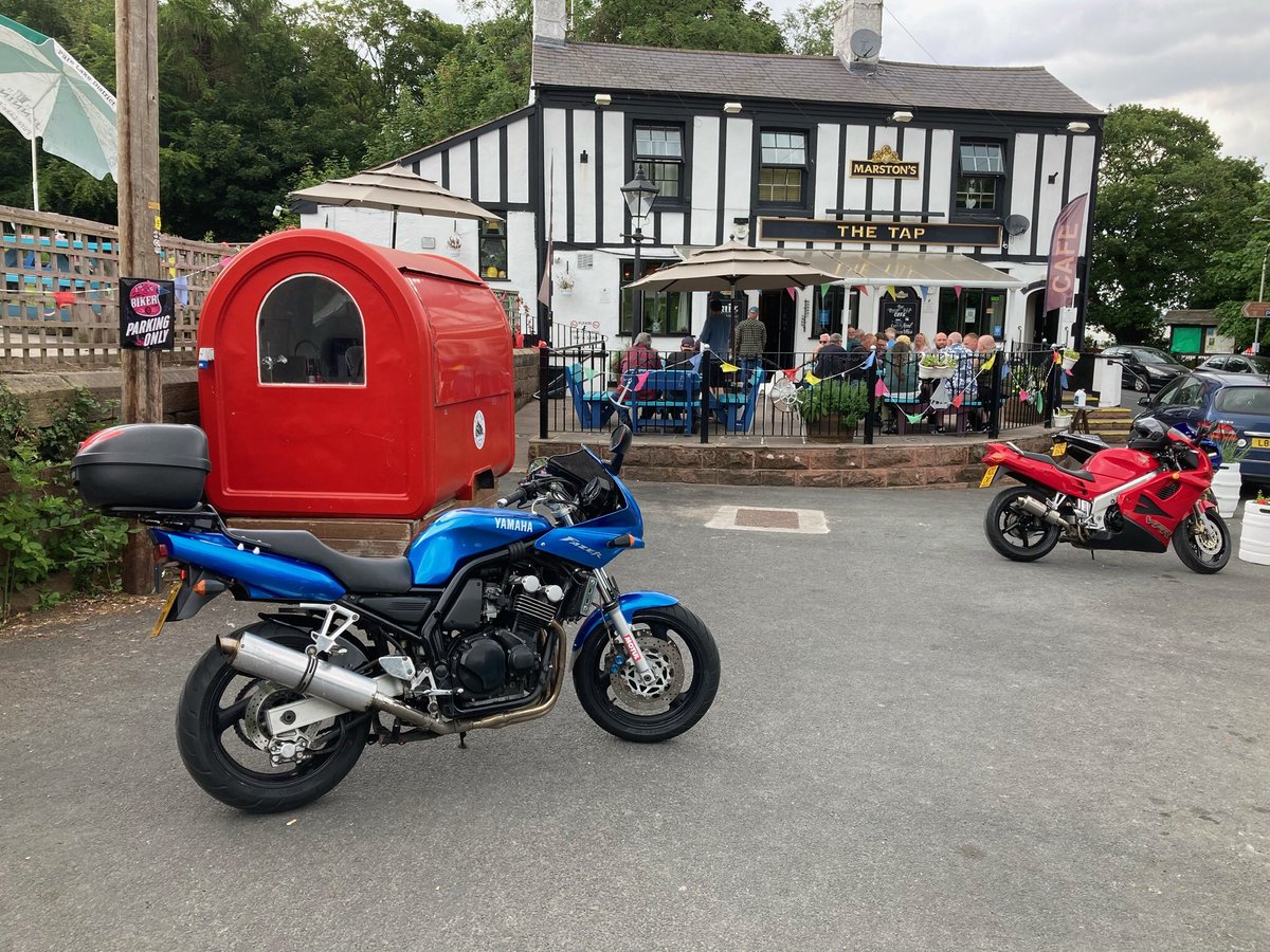 WolTowers's tweet photo. I like a pub that has a motorcycle only parking space. https://t.co/T5AckrDA0U