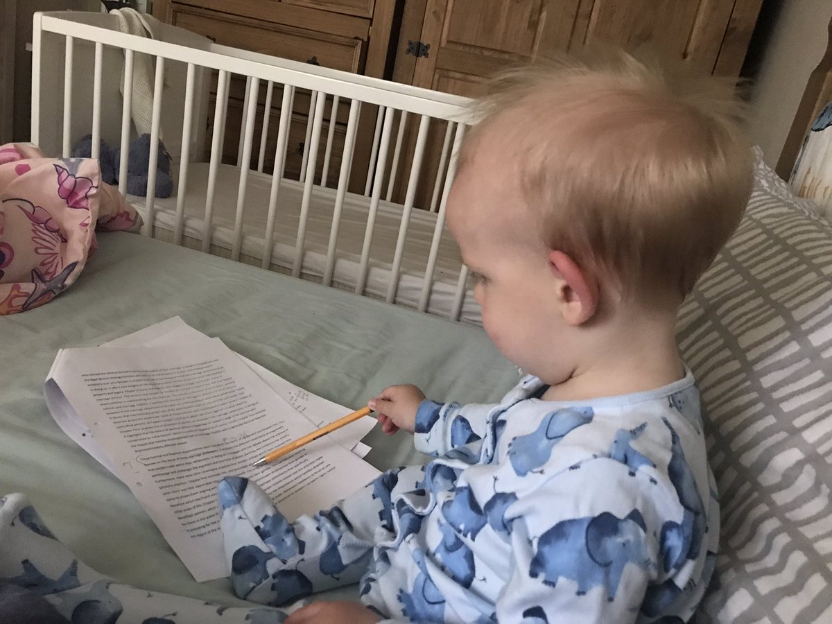 Stormmnadira's tweet photo. 10 month old proof reading PhD chapters. Hmm … just one or two typos mummy. #harshcritic #phdlife https://t.co/3EObgkr3vC
