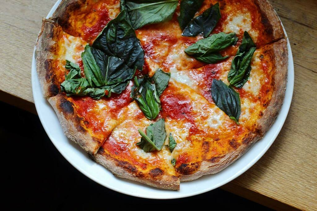 Friday nights are better with pizza 🍕 

#pizzaparty #brickovenlovin #margheritapizza #freshbasil #buffalomozzarella #rva #raleigh #cary #sodacity #tazzakitchen