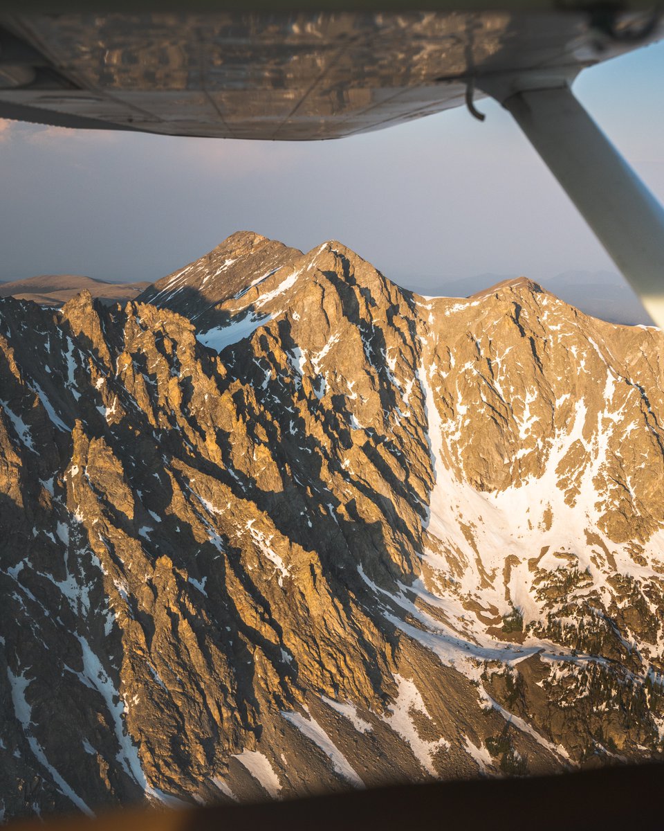 flying by mountain peaks