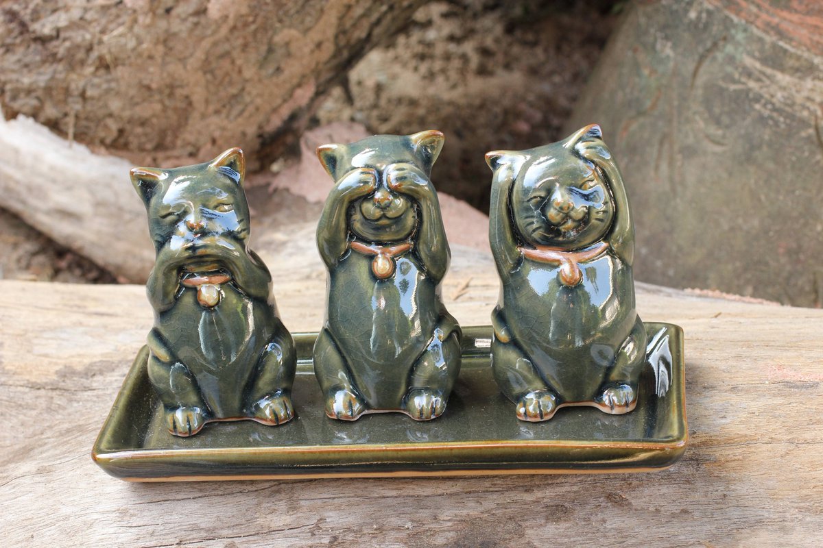 These beautiful artisan-crafted celadon ceramic cats are made in Thailand. They are called, "Cats Shun Evil" and are posed in the traditional "Speak no.." "See no.." and "Hear no evil." They promote kindness and positivity. See them here: bit.ly/2TK14hd.  #handmade4life