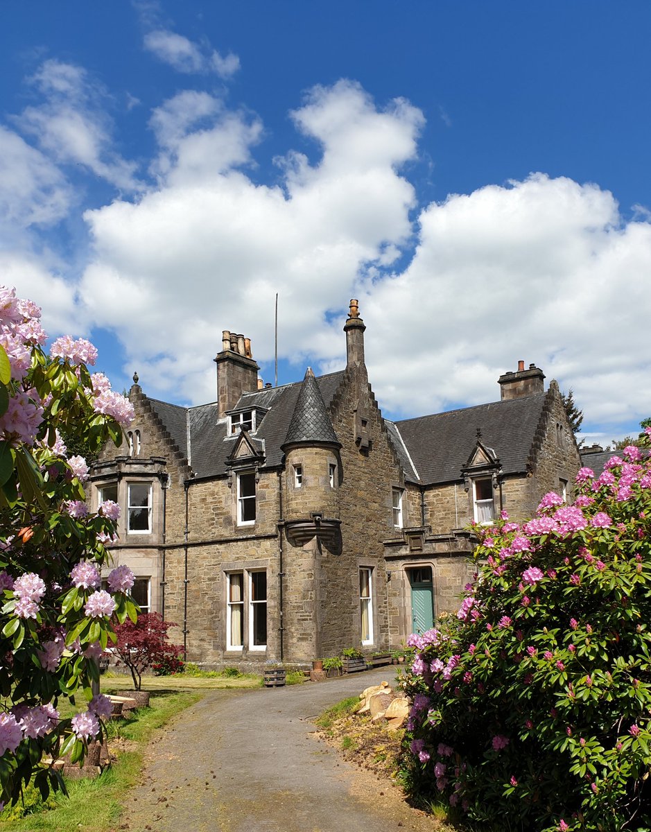 Not a movie, an episode of the TV series, Cold Feet. The group of friends travelled to Scotland to stay in a castle for a birthday celebration. Scotland is stunningly beautiful and there are many castles. While Isla Bank House isn't a castle it does have wonderful Turrets!