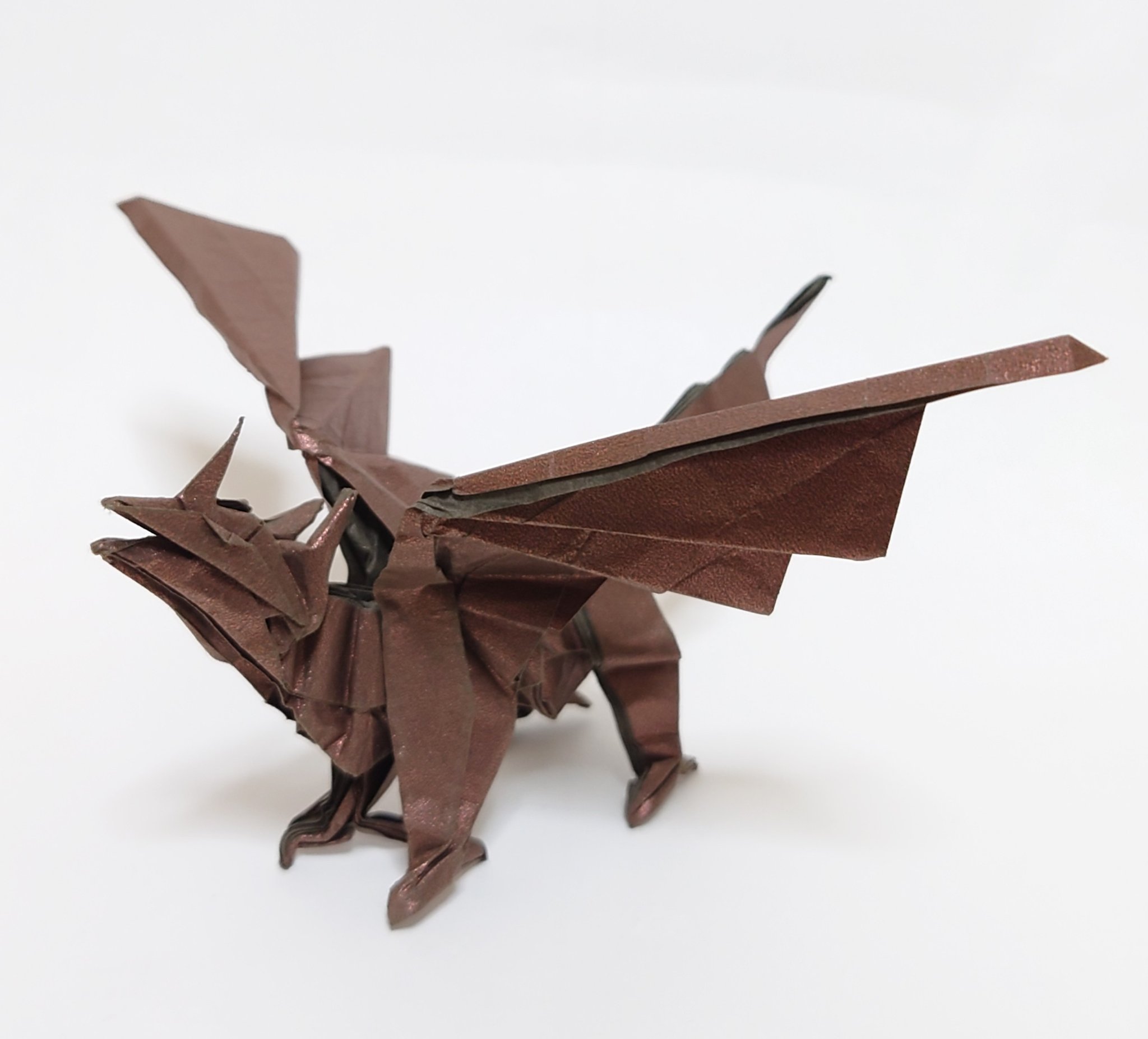 Hana 折り紙作品 106 今週も 山口真 さんの新刊図書 Origamidragons から折るものを選びました 大内康治 さんの スマートドラゴン です 大好きな段折りから かっこいいドラゴンに折りあげていく工程が楽しかったです 折り紙 おりがみ Origami
