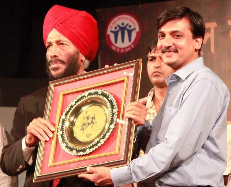 balrakshabharat's tweet photo. We're saddened by the demise of legendary #MilkhaSingh ji. We've had a cherished association with #TheFlyingSikh. In 2013, he supported our 'No Child Born To Die' campaign. He was a true champion for children's cause. His legacy will continue to inspire the coming generations🙏. https://t.co/kj3SbpFTdI