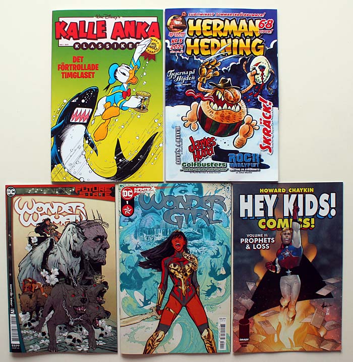Caltex_98's tweet photo. June #comichaul I: #KalleAnkaKlassiker 2/2021, #HermanHedning 3/2021, #FutureState #WonderWoman #2, #WonderGirl #1, #HeyKidsComics #1 #Reckless 2 #EdBrubaker, #ShesJosie #DanDeCarlo #FrankDoyle, #SpellOnWheels #2 @Joelle_Jones @kateleth #comics #serier #carlbarks https://t.co/Vy0tejHxDL