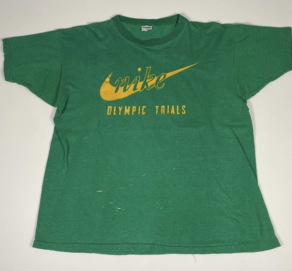 Darren Rovell on Twitter: "The evolution of On the left is Nike's first apparel item ever — a T shirt for the 1972 Olympic Trials On the is