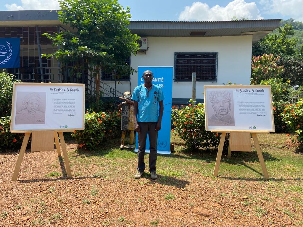 IntlCrimCourt's tweet photo. New #ICC exhibit “From the shadows to the light” with Artist Didier Kassaï opened today at La Maison de la Mémoire in #CAR. Aiming to make the role of victims in the justice process more visible, the exhibit features 10 women who represent victims associations. #EndRapeInWar https://t.co/1JWifOGG84