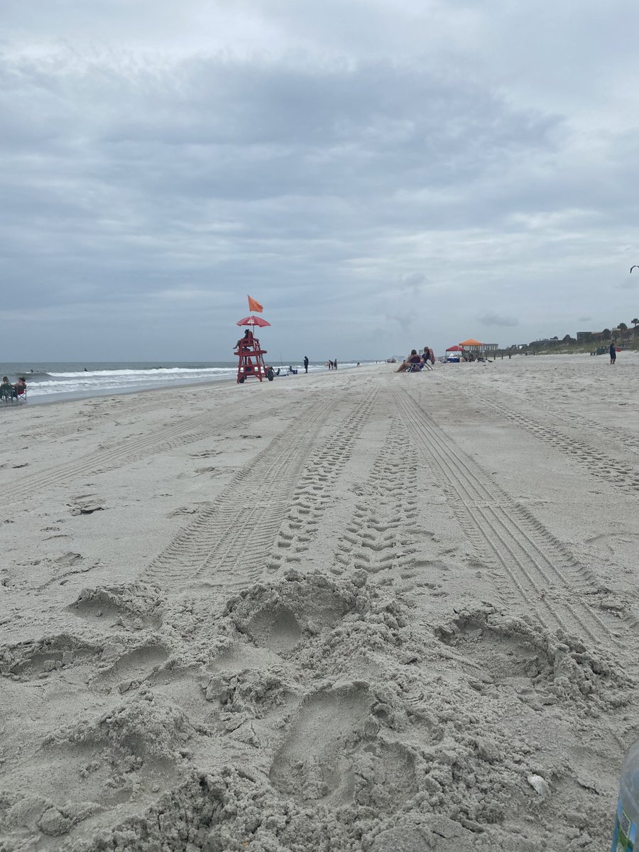 BekDanielle's tweet photo. @sydneyboles @WJCTNews The overreaction is definitely a reality , here’s what the beach is looking like now...but we’ve seen about ten police golf carts pass by in the last hour🙄. https://t.co/sytwI2niMH