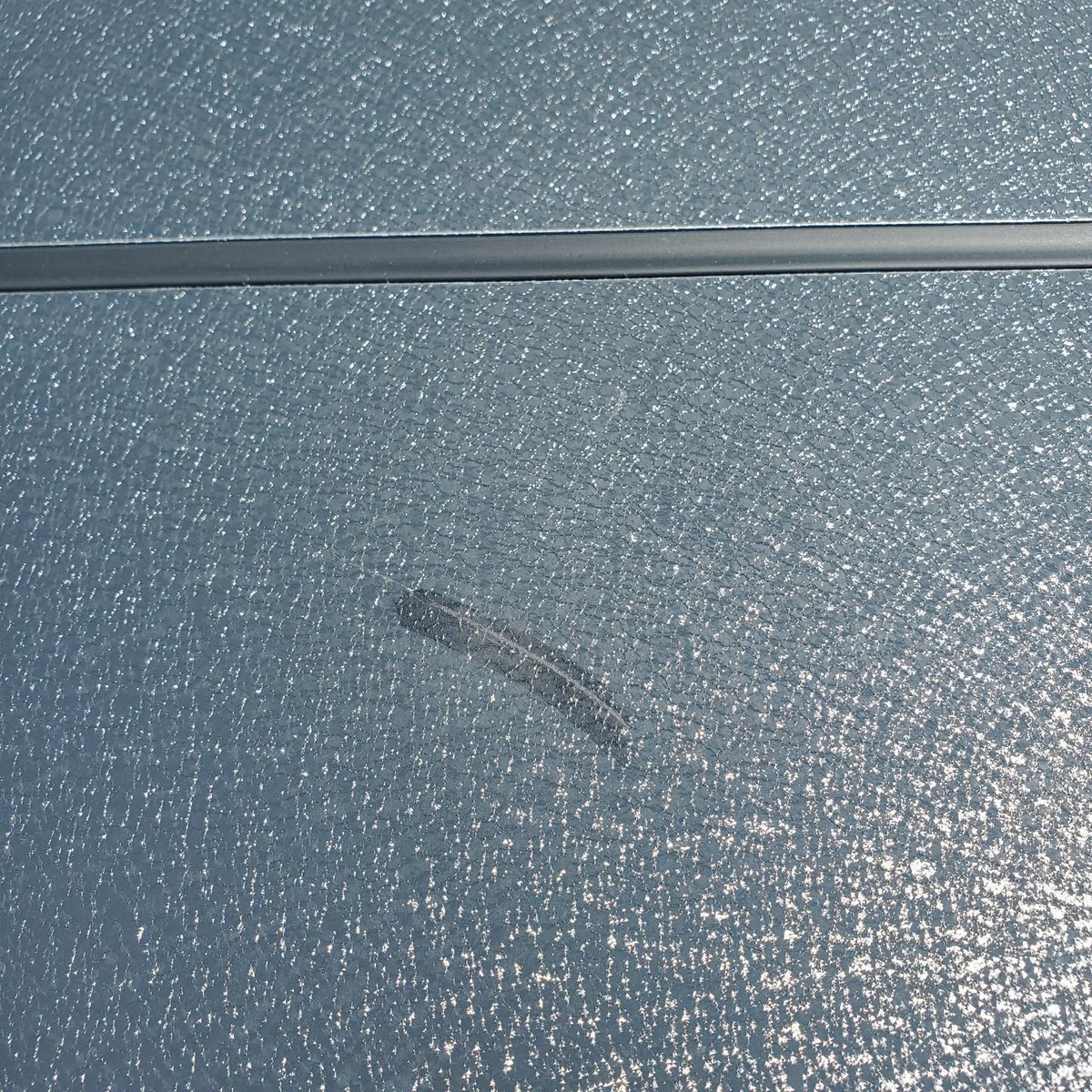 Riccal23's tweet photo. @WeatherTech hey how come my brand new alloy top has a repaired scratch on it? https://t.co/WbJgu46Oqf
