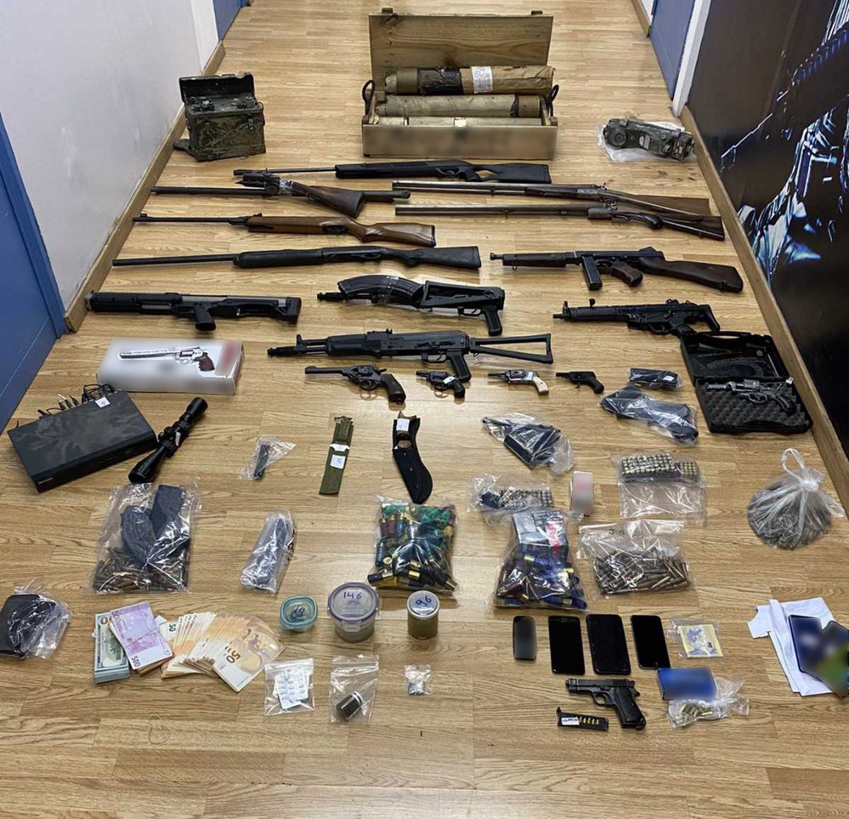 PotempkinBrain's tweet photo. I like to bang on about the accessibility of firearms in #Greece, but this #CopGhanima photo from the Hellenic Police is a good representation of what's out there illicitly: M1921 Thompson, MP5A3, and some kind of AK 103-104 variants, among multiple handguns and shotguns 1/: https://t.co/PID24nFDsf