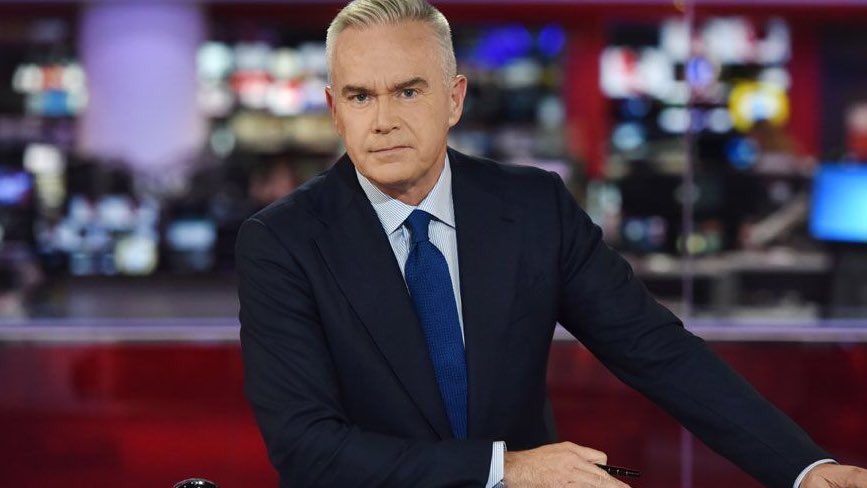 Huw Edwards returns to BBC News after serving six-week suspension for sneaking Beautiful South song titles into bulletin scripts.

“I’ve got to be good as gold from now on,” he told reporters