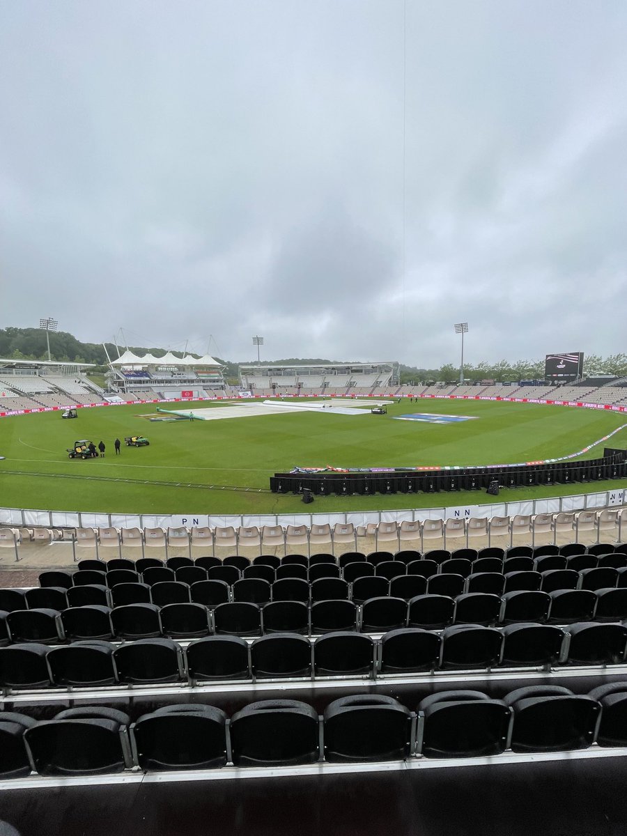 jobsworth's tweet photo. Priorities. My vantage point for the next three days. Come hail or storm. An arrangement in grey and black befitting Whistler. Hitchcockian suspense. Will Kohli be out 1st ball? Will he bat all day? Will there be a single ball bowled today? Questions, questions. #WCTFinal #INDvNZ https://t.co/TBixl2nvXV