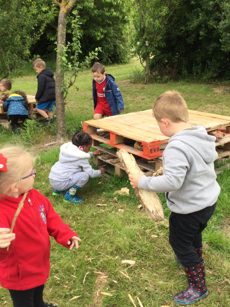 MrsHighcock's tweet photo. When we got to forest school on Friday we were sad to see that our bug hotel had been vandalised. The children worked hard to rebuild it for the bugs 🐜 🐛🪲🪱🕸 and we managed to fit in some gardening too! #forestschool #buildingresiliance @parishschool1 https://t.co/EPgNujohiP