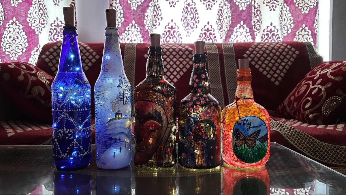 HalderTanya's tweet photo. All my beauties in one frame🍾🥰
#bottleart #bottledecoration #acrylic #artistontwitter #bottlepainting https://t.co/73m6LakjZ6