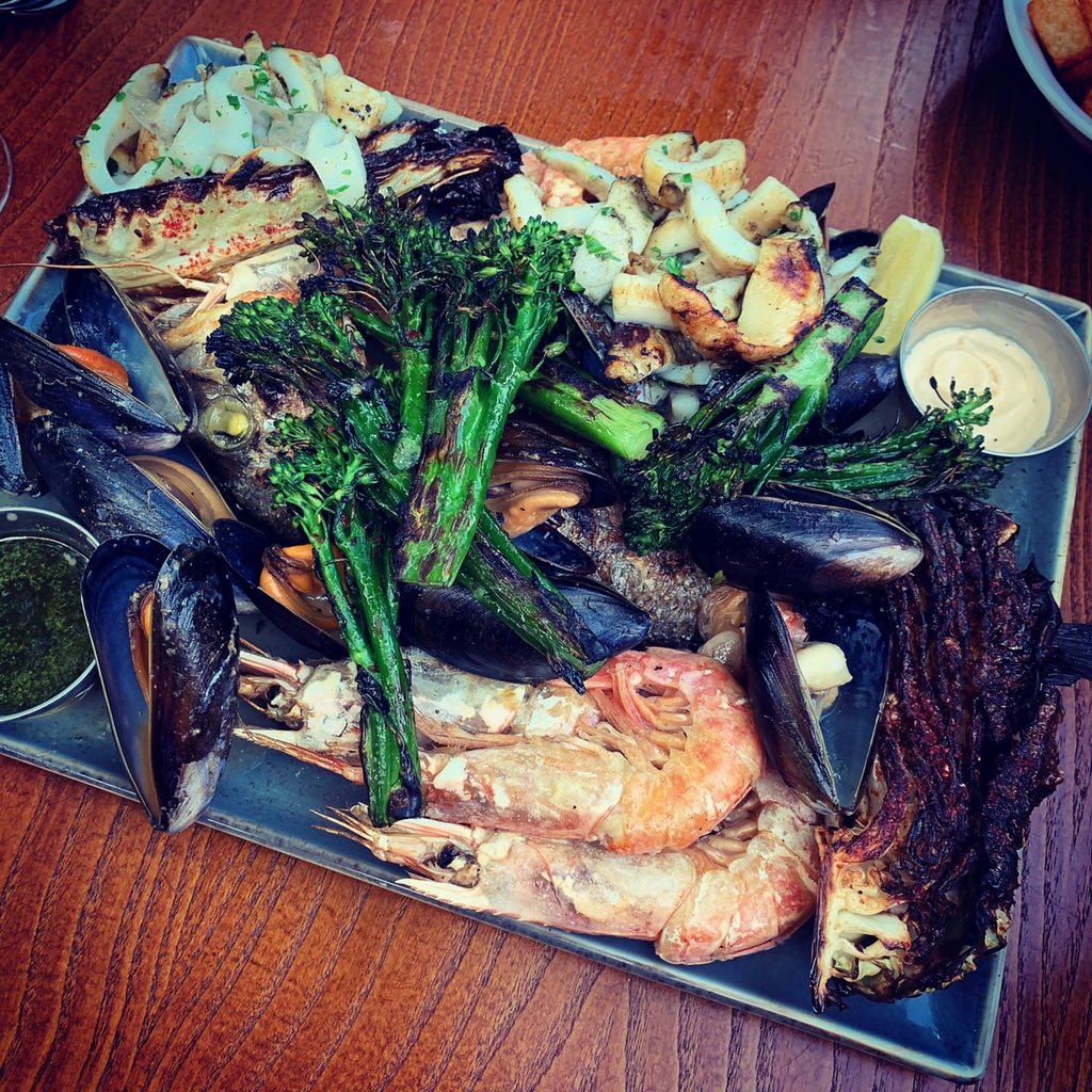 Ridiculously good seafood <a href="/OystercatchMCR/">The Oystercatcher</a>. Luscious oysters and a mega seafood platter. Yum.