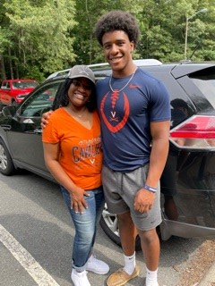 pmccreecross2's tweet photo. I am one happy mom! To see the smile on my son's face tells me he is HOME! UVA take care of my Buddy! Go Hoos!🧡🏈 #moveindayasuccess https://t.co/tHTxWFVhpM