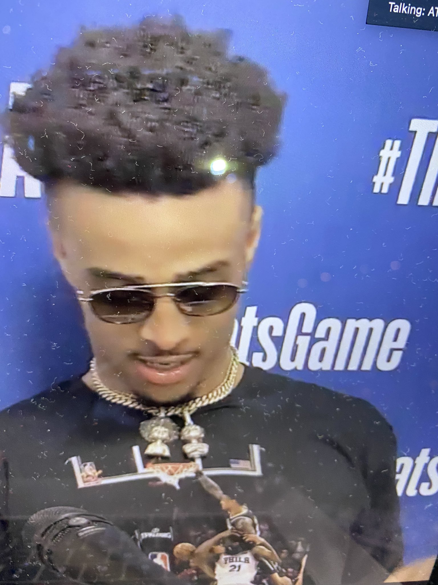 ESPN - John Collins' shirt for post-game interviews featured a