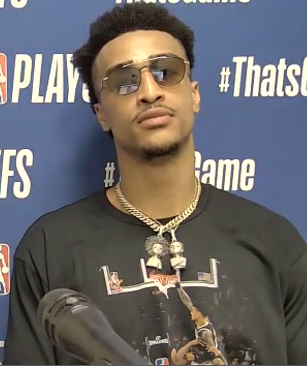 Justin Felder on X: John Collins has a picture of his Game 6 dunk over  Joel Embiid on his t-shirt in his postgame press conference.   / X